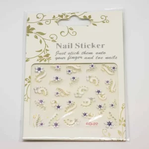 Nagelsmycken lila blomster